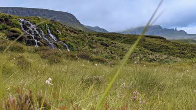 Bride's Veil Falls with the Old man of Storr in the background